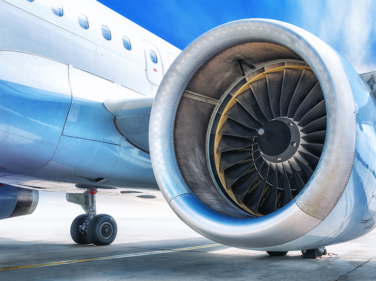 Quantum-ESC composite part with complex 3D geometry and smooth carbon fiber finish on display